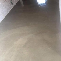 Coulage béton pour future extension de maison et remise à niveau dans un ancien garage pour une future chambre