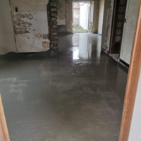 Rénovation dans une ancienne maison avec ouverture de mur porteur et dallage béton