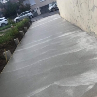 Coulage béton pour future extension de maison et remise à niveau dans un ancien garage pour une future chambre