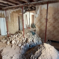 Rénovation dans une ancienne maison avec ouverture de mur porteur et dallage béton