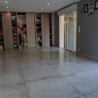 Pose d'un carrelage 90x90 sur un ancien carrelage - Après